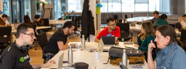 Latin American software engineers working.