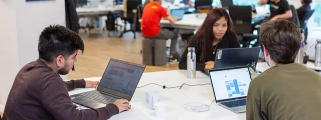 Software engineers working in an office