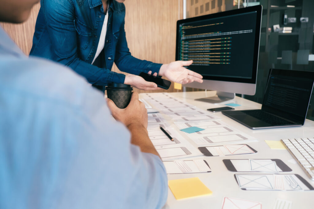 Programmer and UX UI designer working in a software development and coding technologies. Mobile and website design and programing development technology.