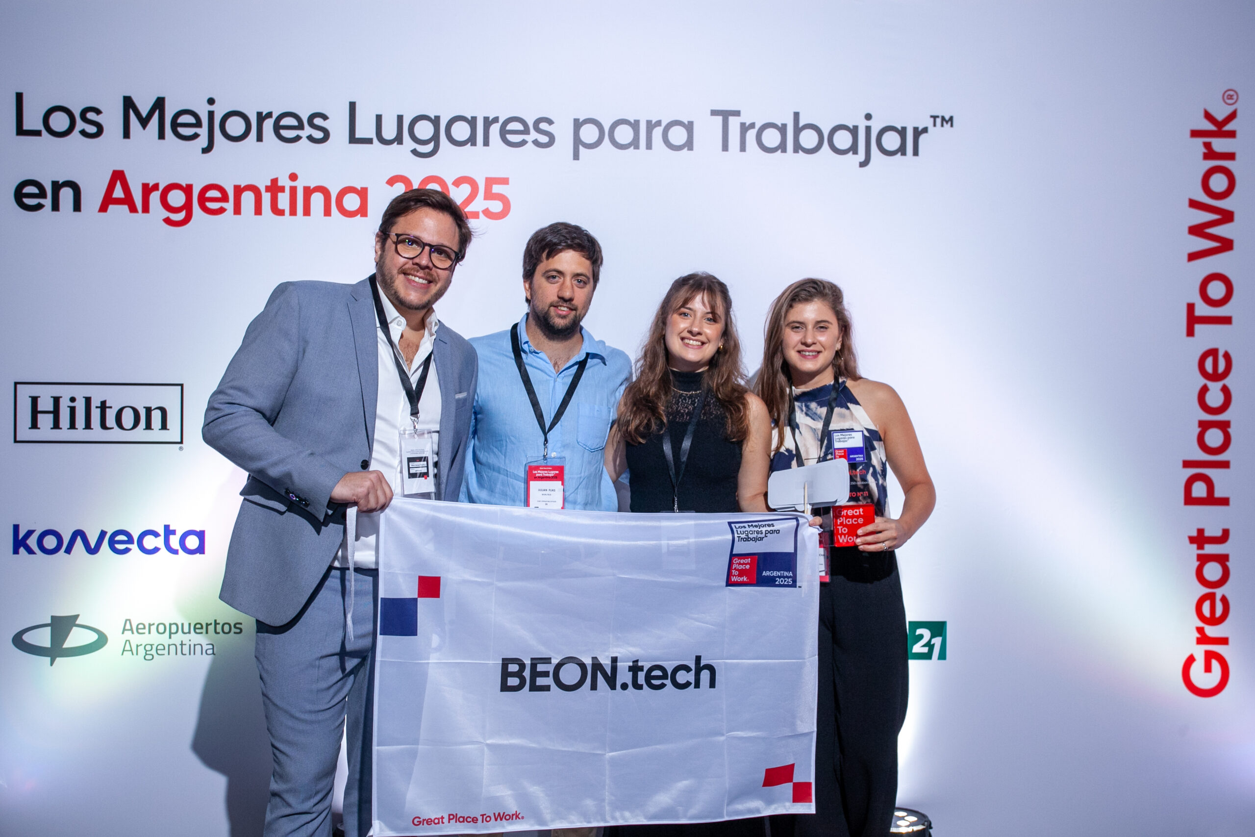 BEON.tech representatives at the Great Place to Work Gala receiving the award. 