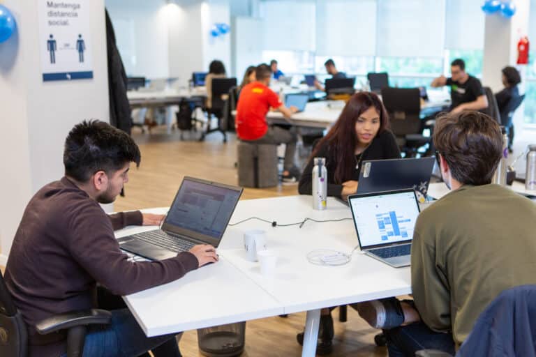 Software engineers working in an office